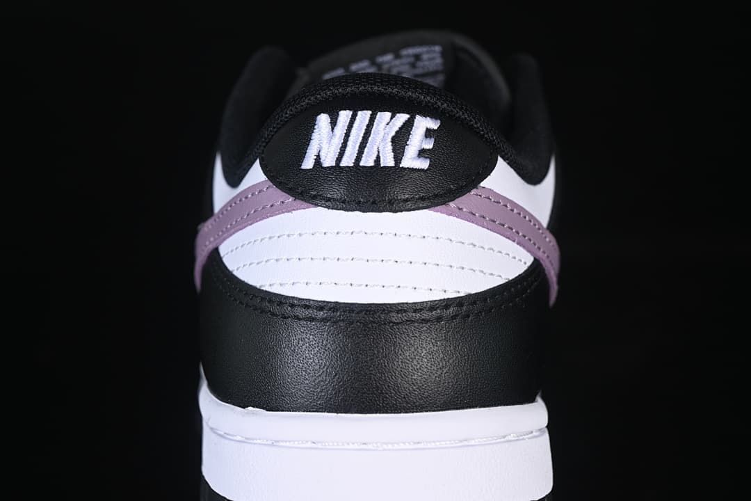 Rear view showing black, white, and purple heel panels