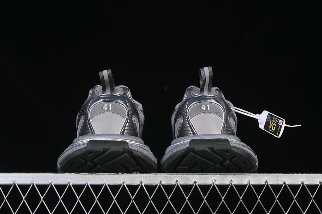 Rear view of the pair showing heel tabs and size markings.