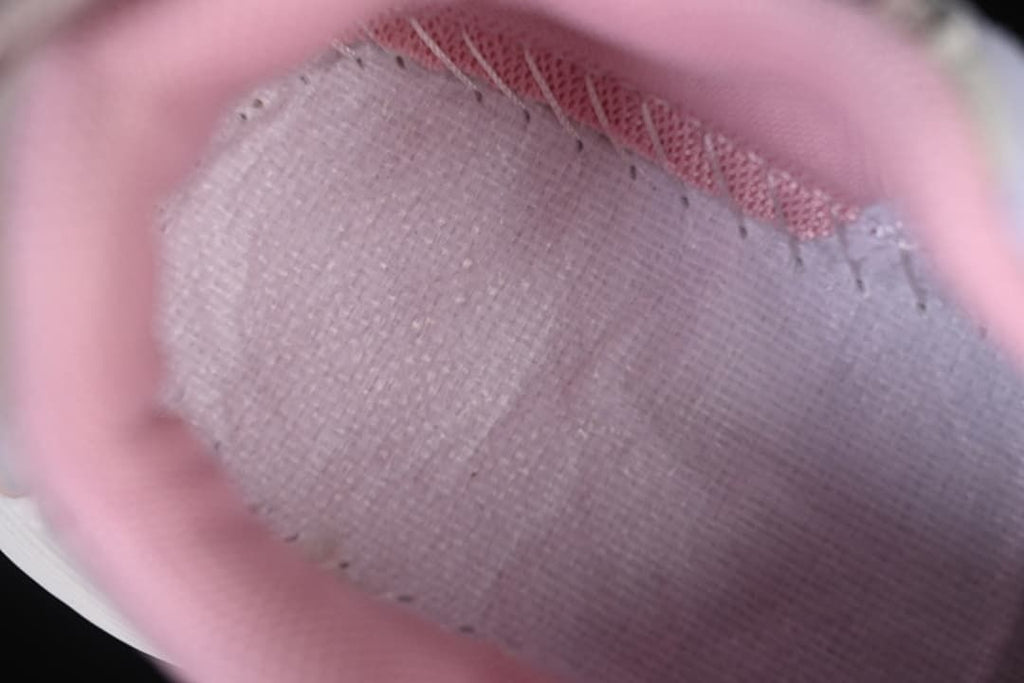 Close-up of the pink padded interior and lining