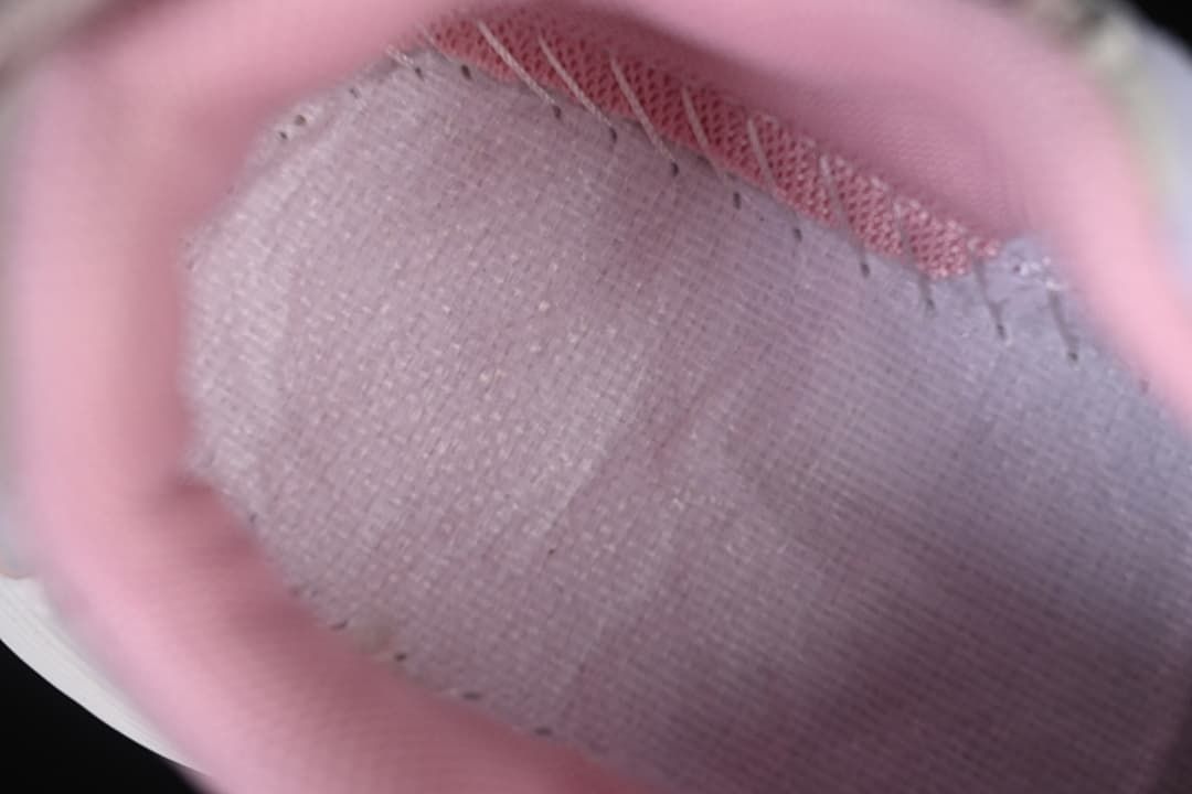 Close-up of the pink padded interior and lining
