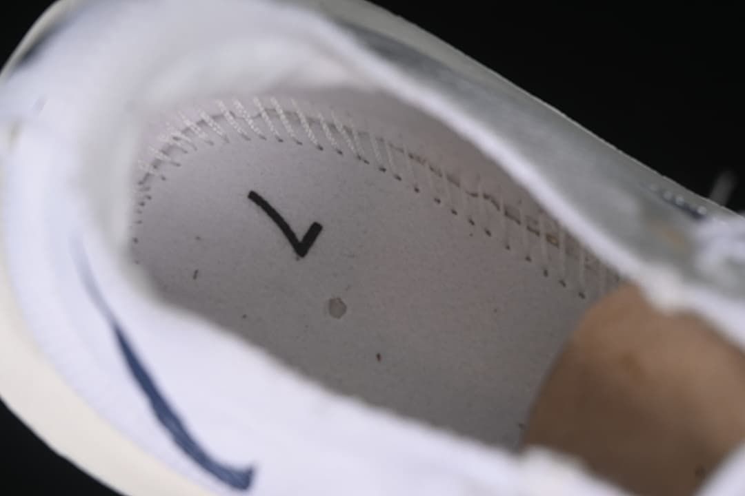 Interior view of the shoe with a visible size mark