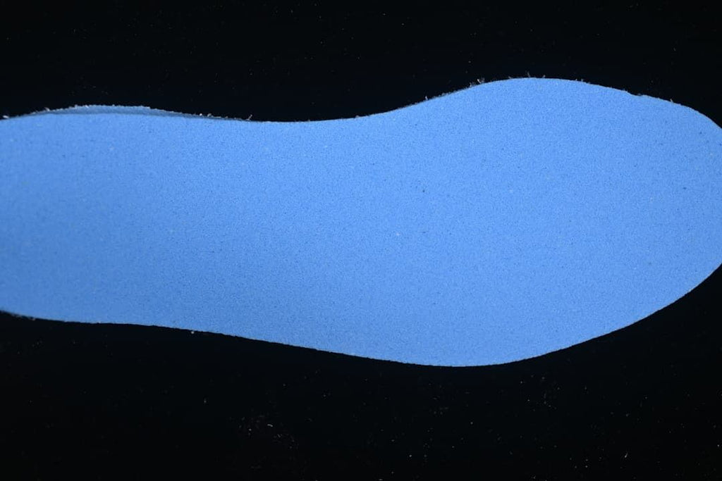 Blue shoe-shaped insert shown on a dark background.