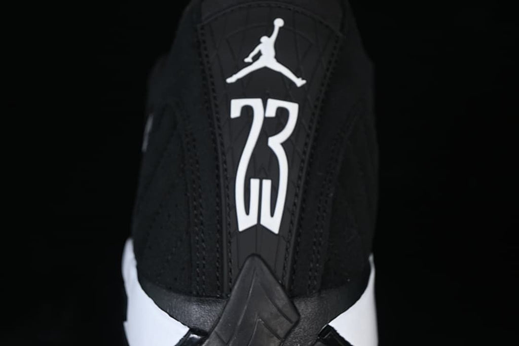 Rear view with white Jordan branding and the number 23