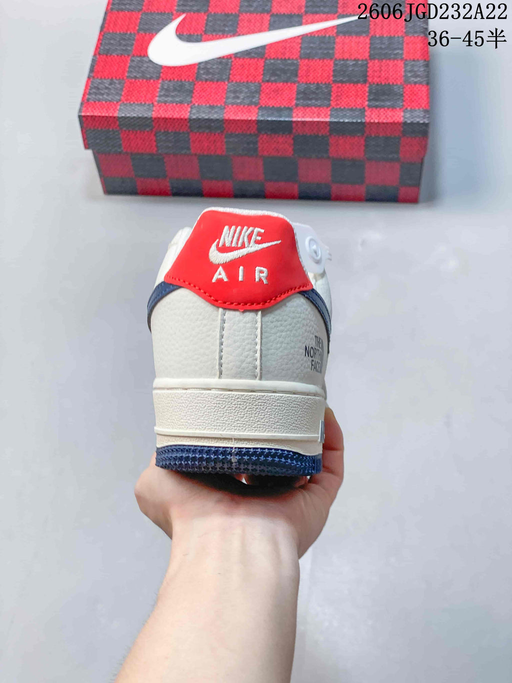 Rear view showing the red heel tab and white heel panel.