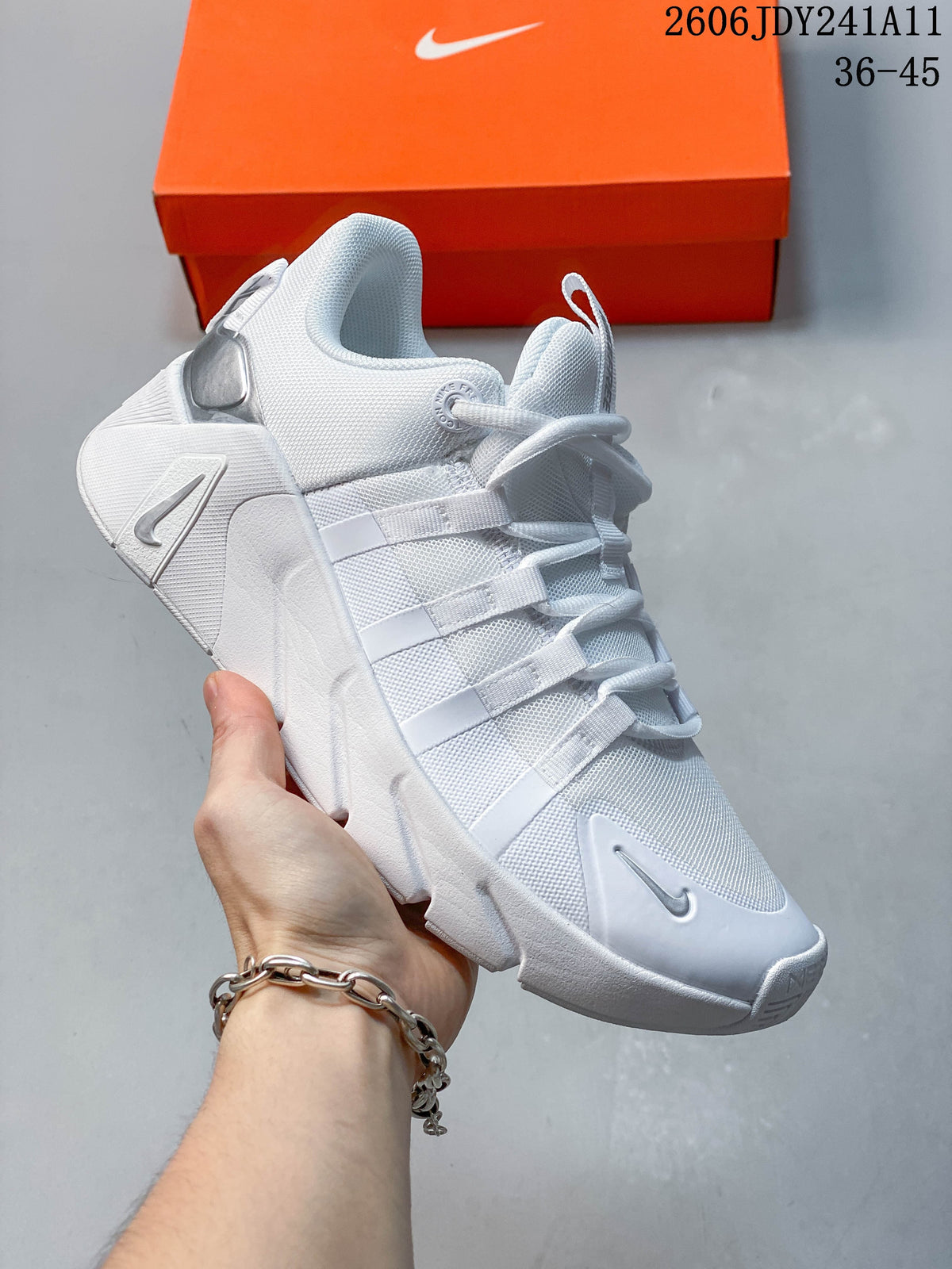 Close-up of a white Nike Free Metcon 7 training shoe with silver-gray details.