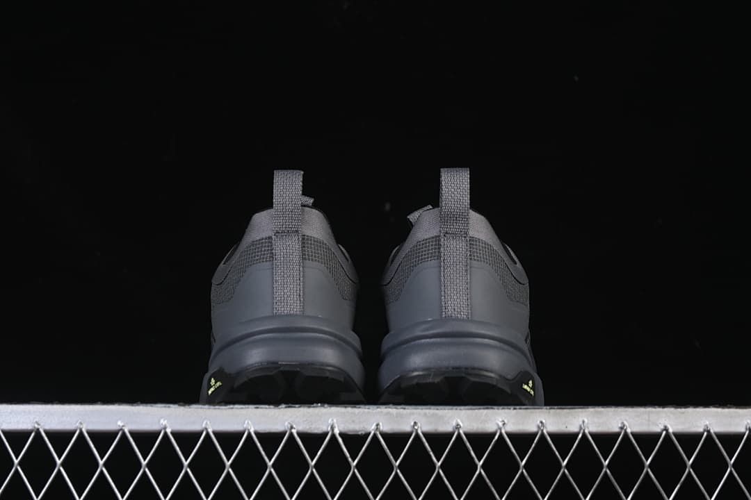 Rear view of both shoes showing heel pull tabs