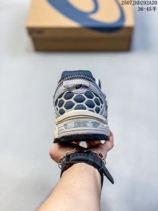 Rear view of the ASICS Gel-Kahana 8 sneaker showing the heel structure and patterned rear outsole.