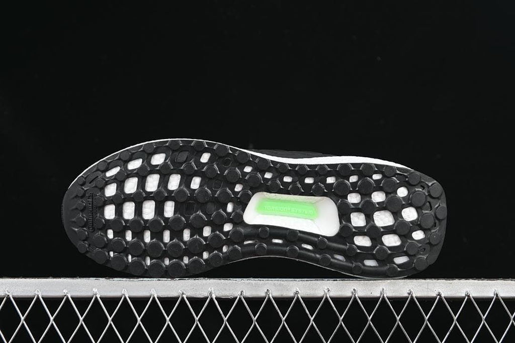 Outsole view showing the black tread and white midsole.