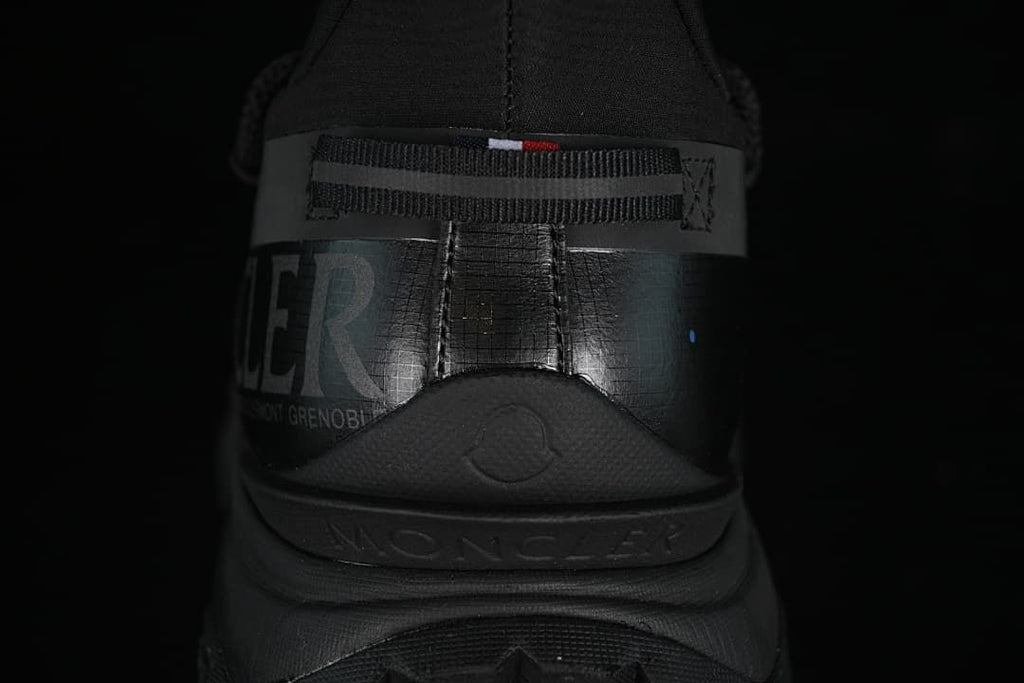 Rear view showing the sneaker heel and branding details