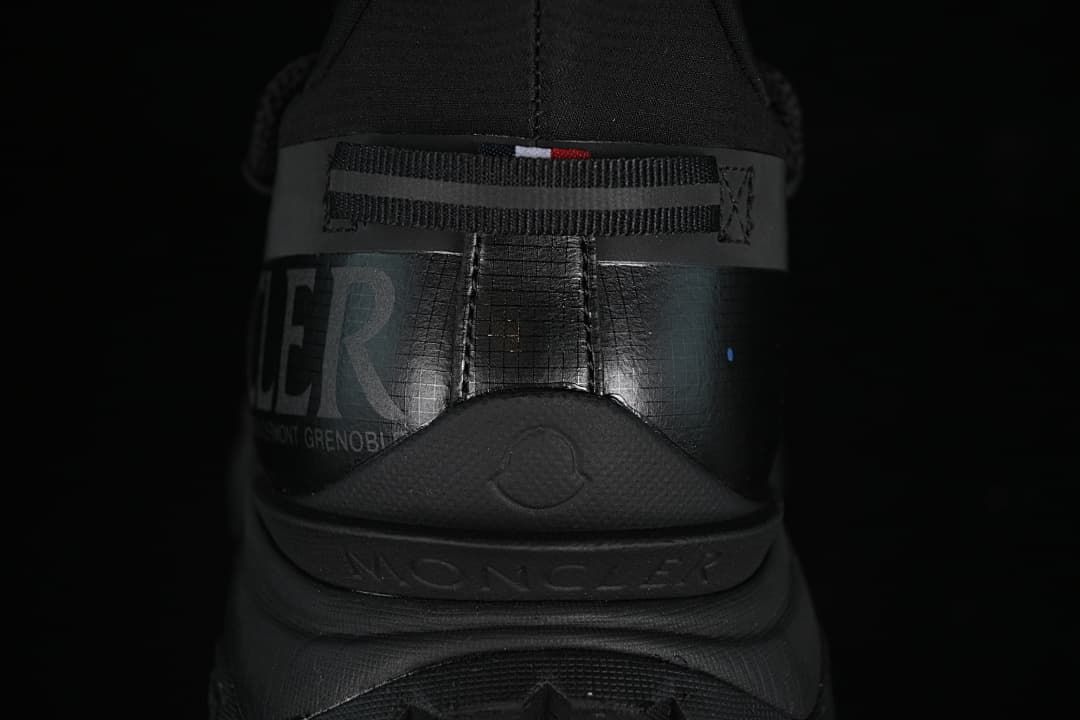 Rear view showing the sneaker heel and branding details