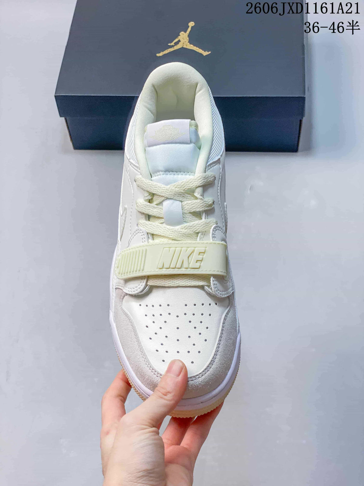 Top view of the Jordan Legacy 312 Low showing perforated toe, laces, and front strap