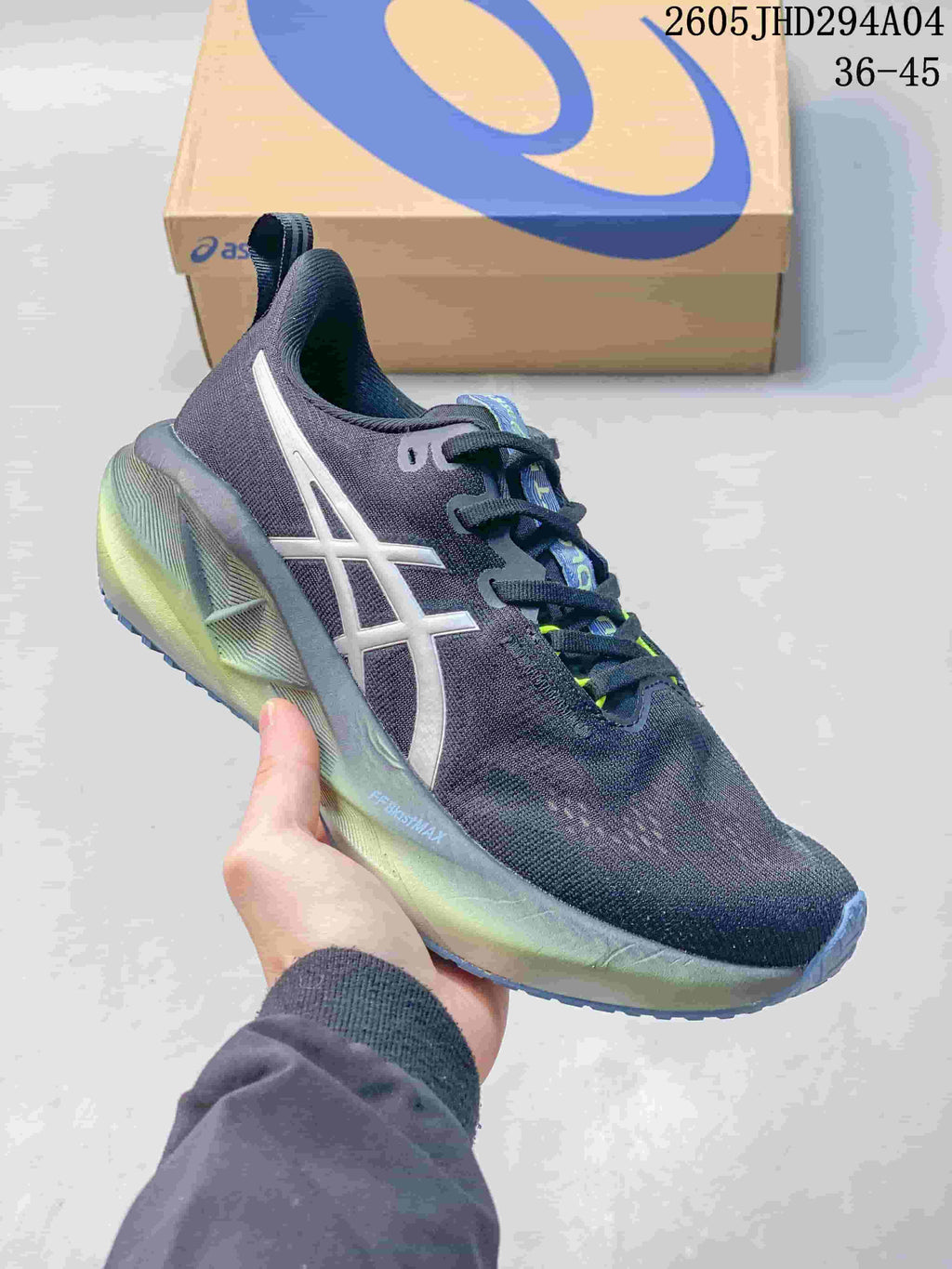 Dark navy ASICS NOVABLAST 5 LE running shoe with a light-colored side logo