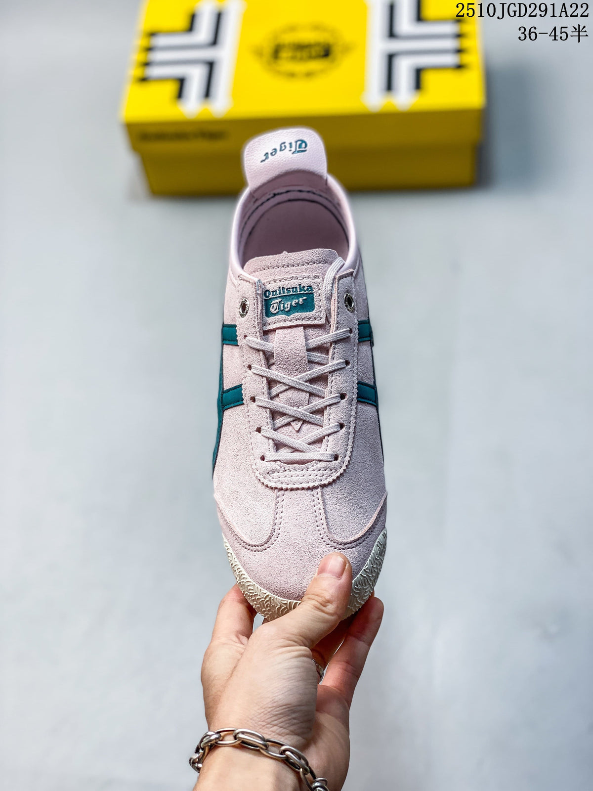 Front view of a pale pink lace-up sneaker with teal accents and a branded tongue label