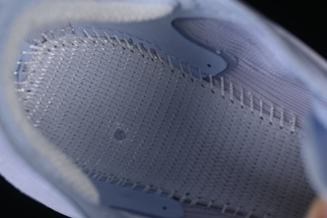 Detailed view of the shoe’s inner upper and stitching