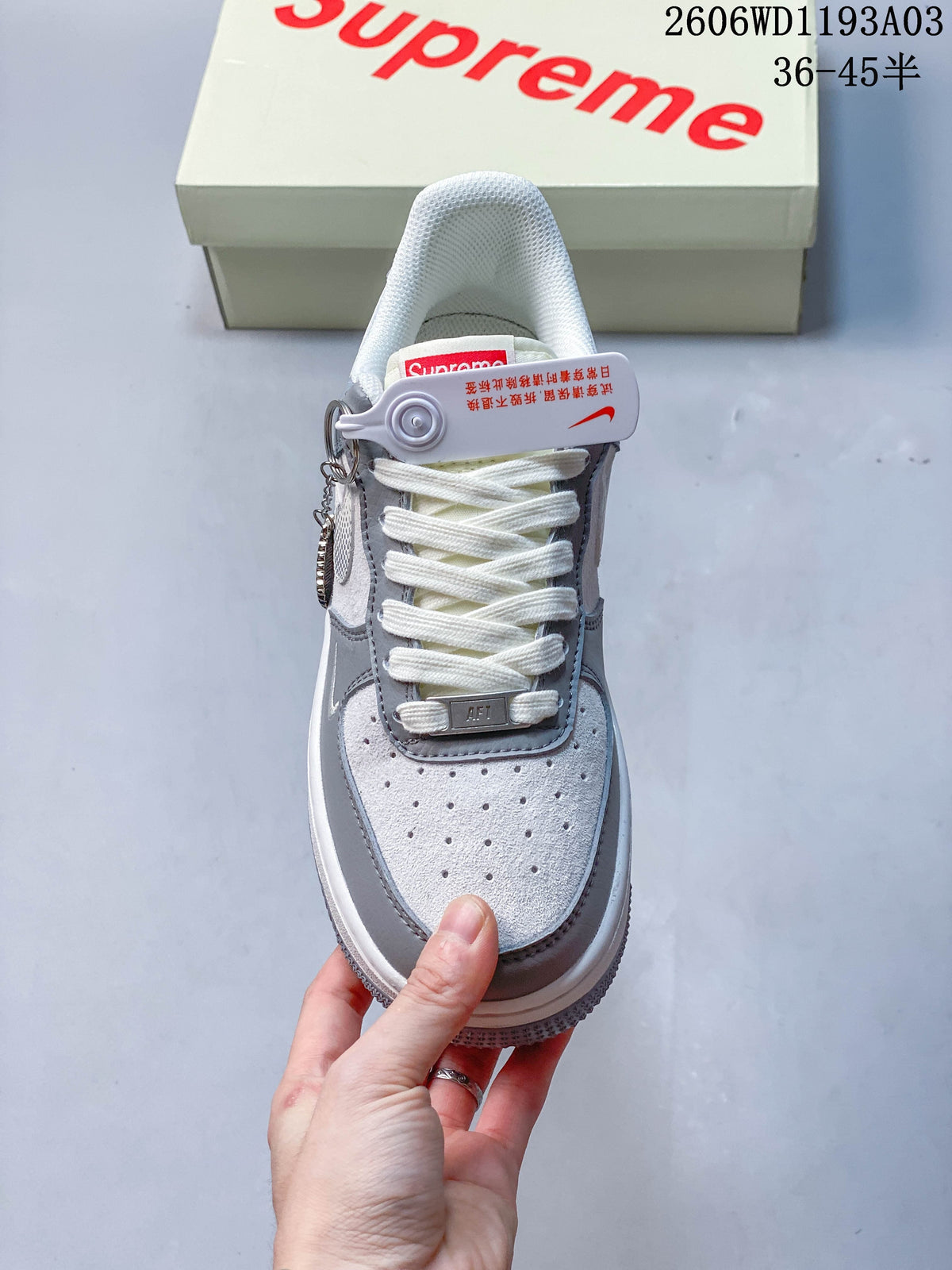 Front view of the perforated toe and white laces