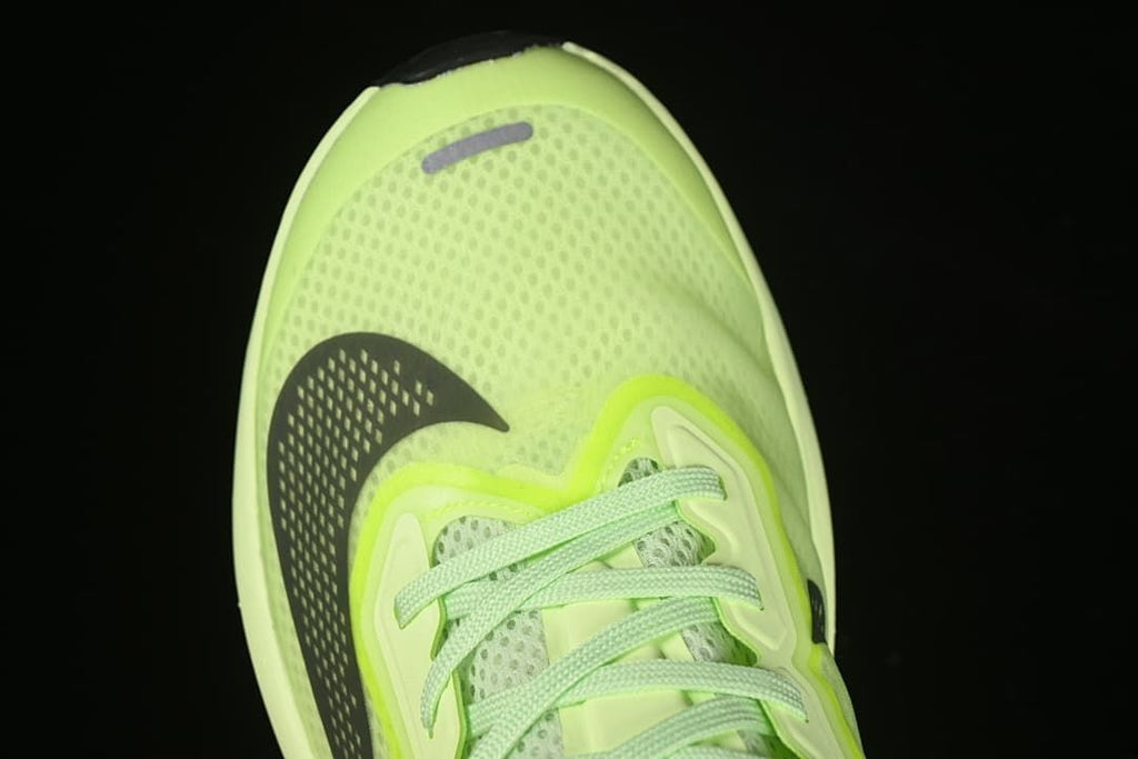Top view of the mesh toe, laces, and dark Swoosh.