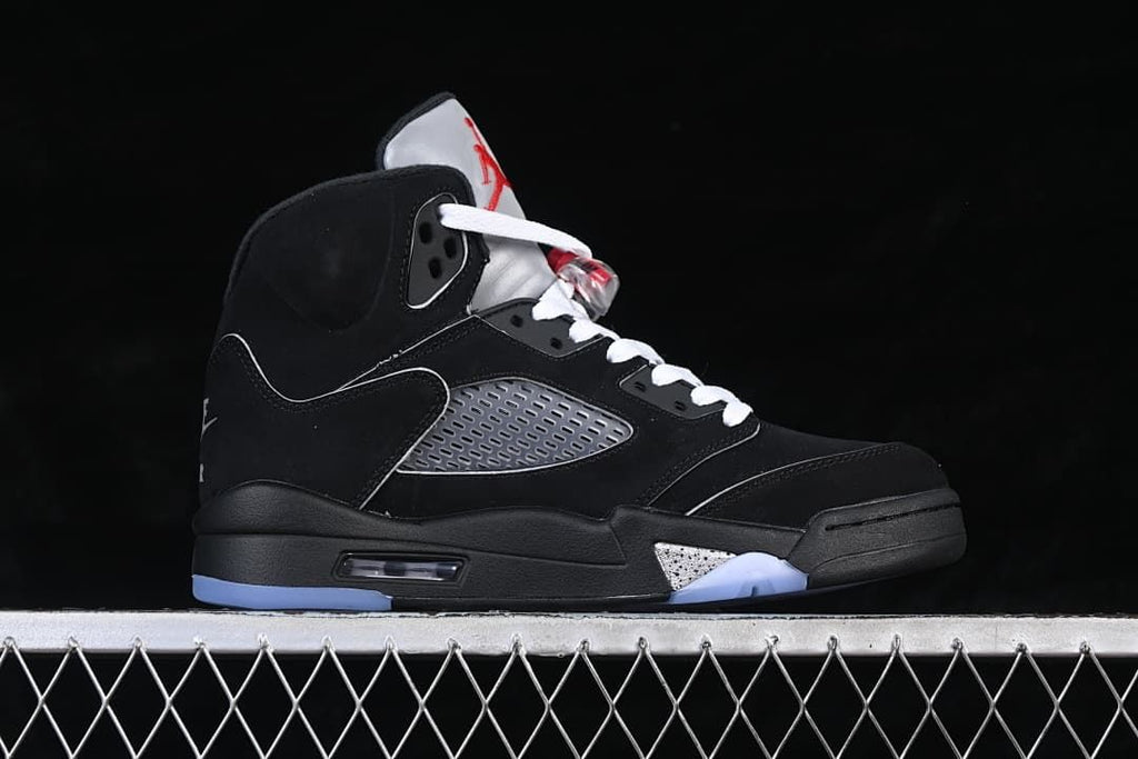 Side profile highlighting the black upper, gray panel, and icy blue outsole