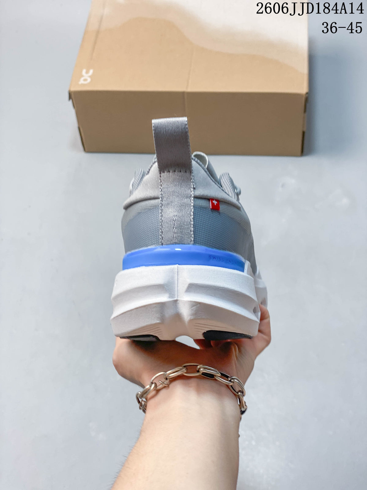 Rear view of the sneaker with gray heel tab and blue heel accent