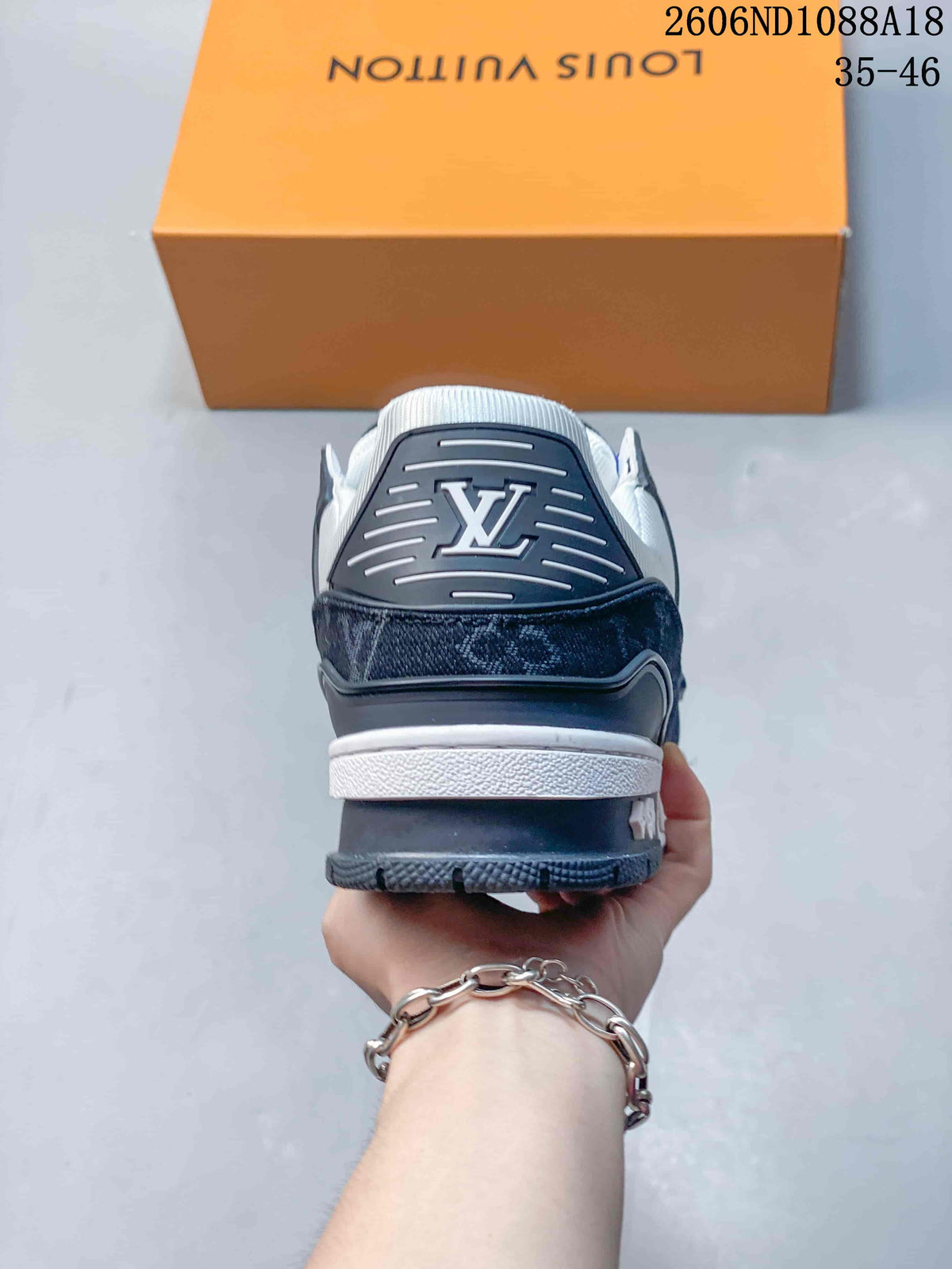 Rear view showing the heel panel and layered sole