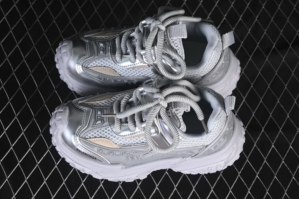 Pair of silver chunky sneakers viewed from above