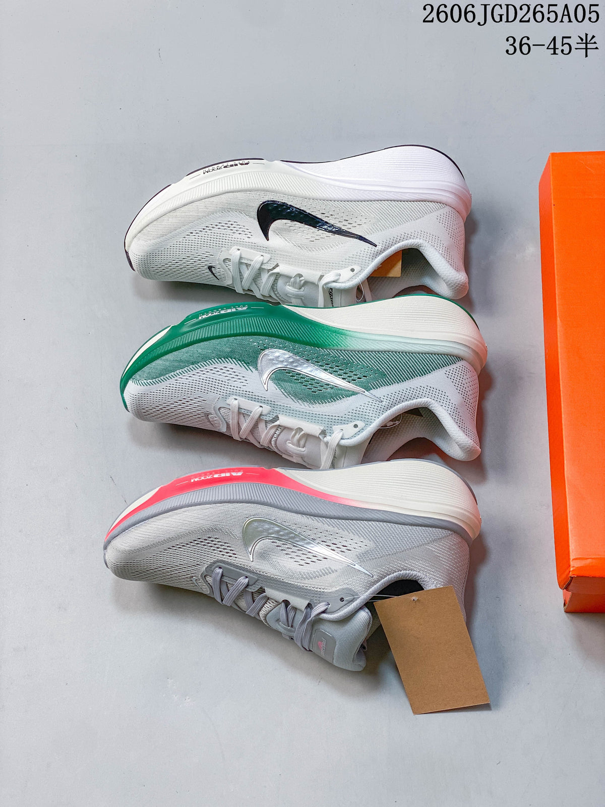Side view of three Nike Pegasus 42 running shoes in different colorways.