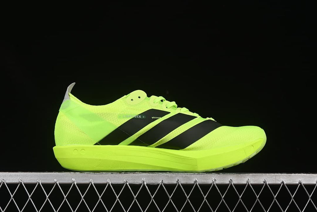 Side profile showing the shoe's upper, stripes and sole