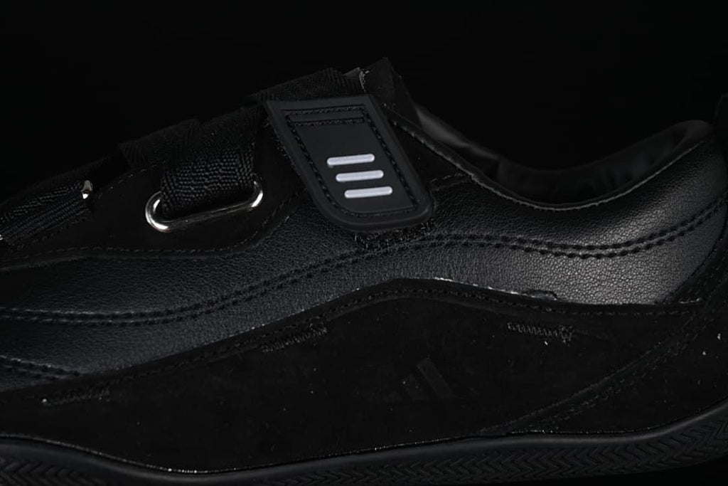 Close-up of the side strap, eyelet, and upper panels