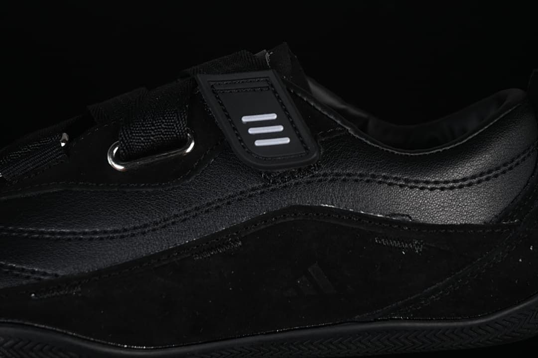 Close-up of the side strap, eyelet, and upper panels