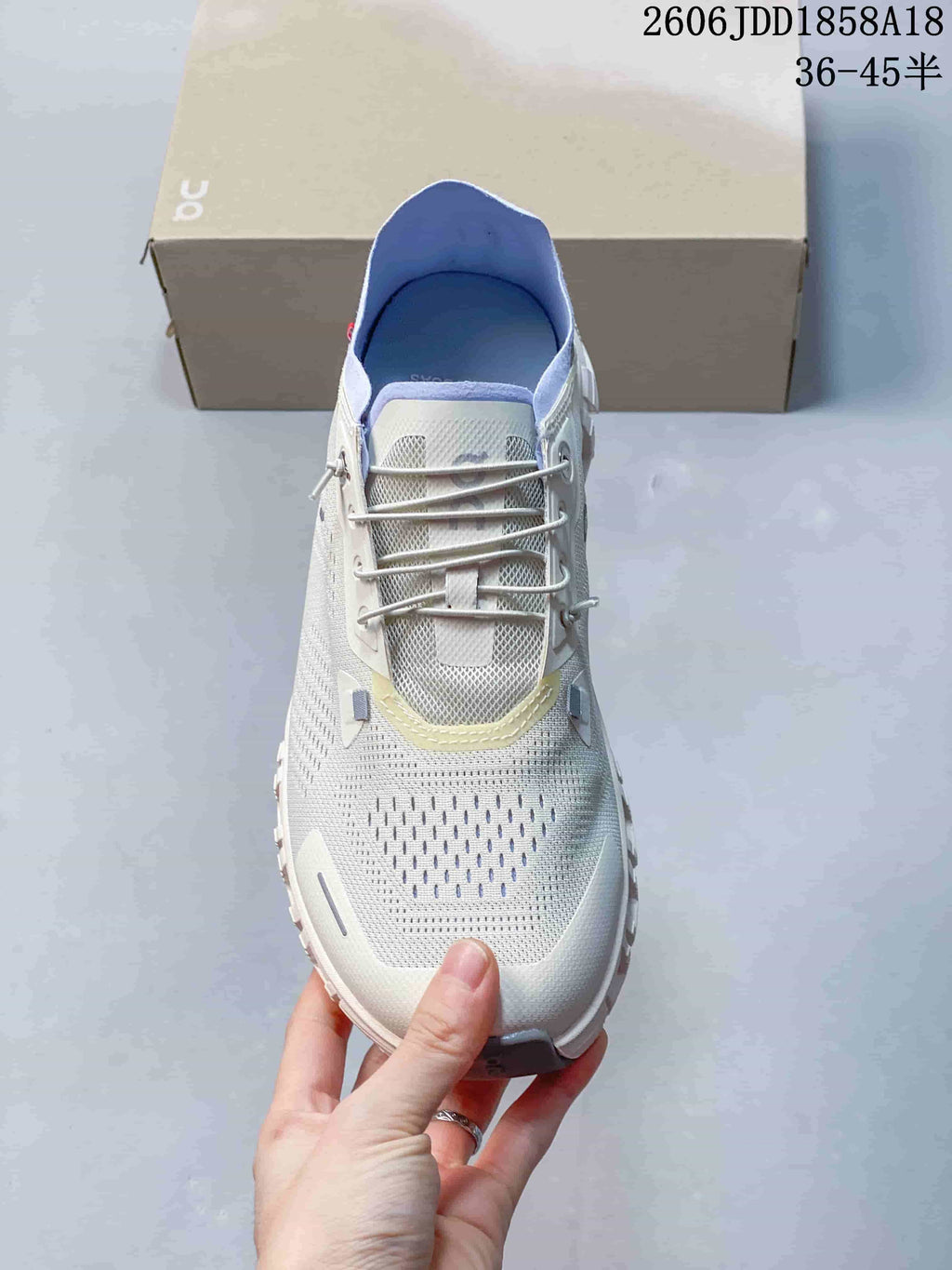 Top view of the sneaker with elastic-style laces