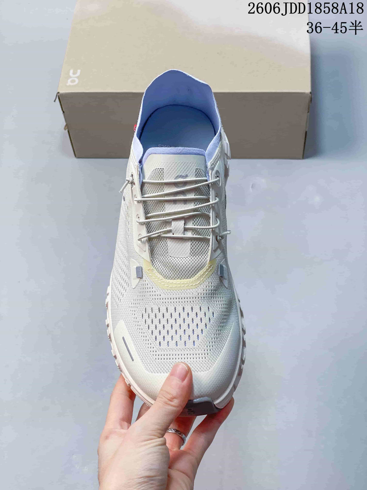 Top view of the sneaker with elastic-style laces