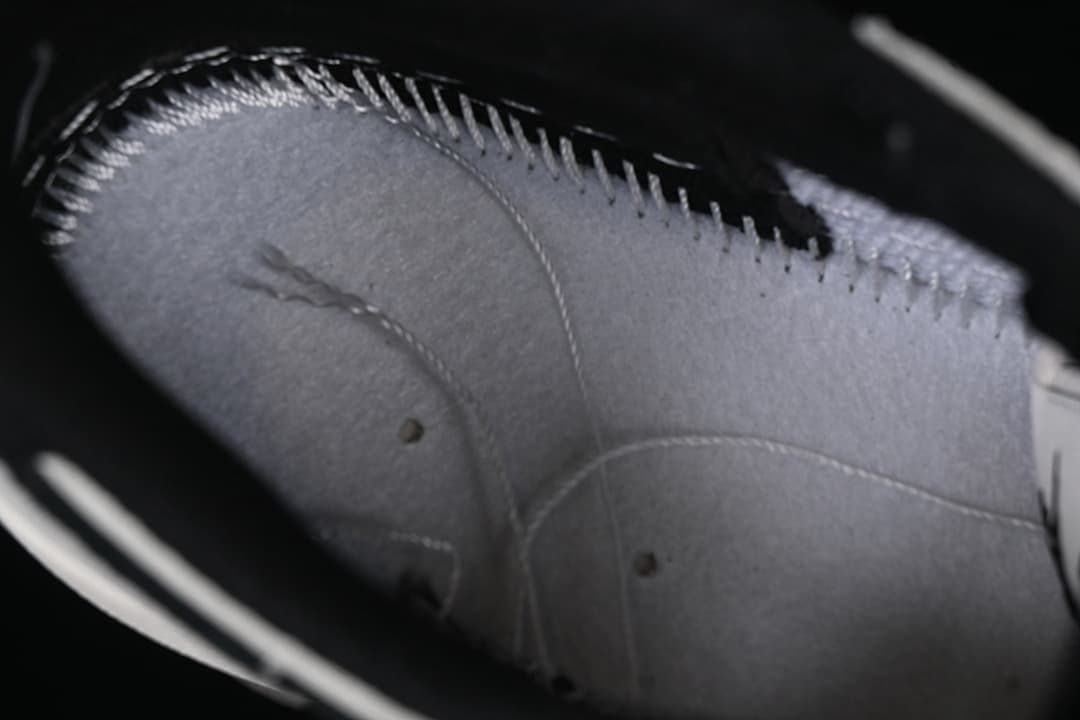 Close-up of the sneaker's interior stitching and lining.