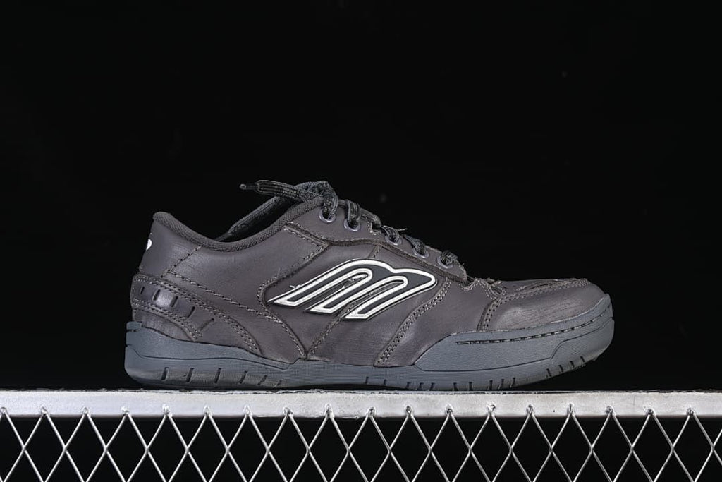 Side profile of the grey lace-up sneaker