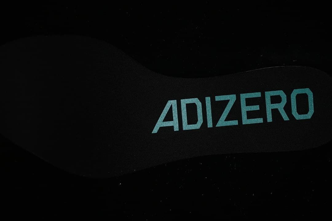 Close view of the insole with Adizero branding.