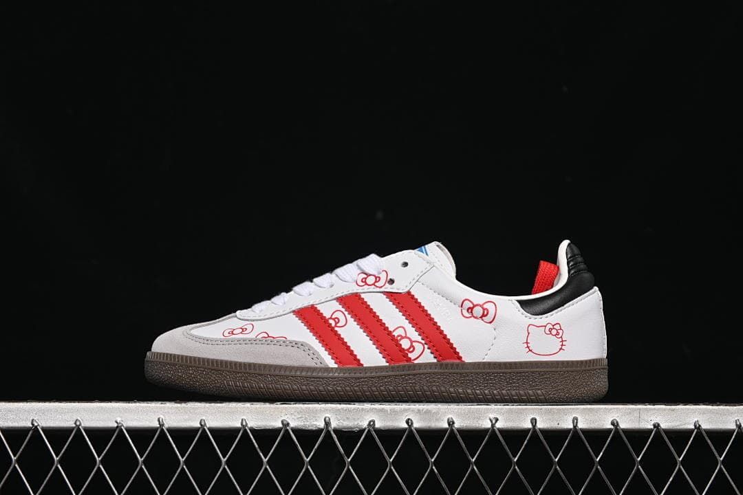 Side view of the sneaker with Hello Kitty graphics and red stripes