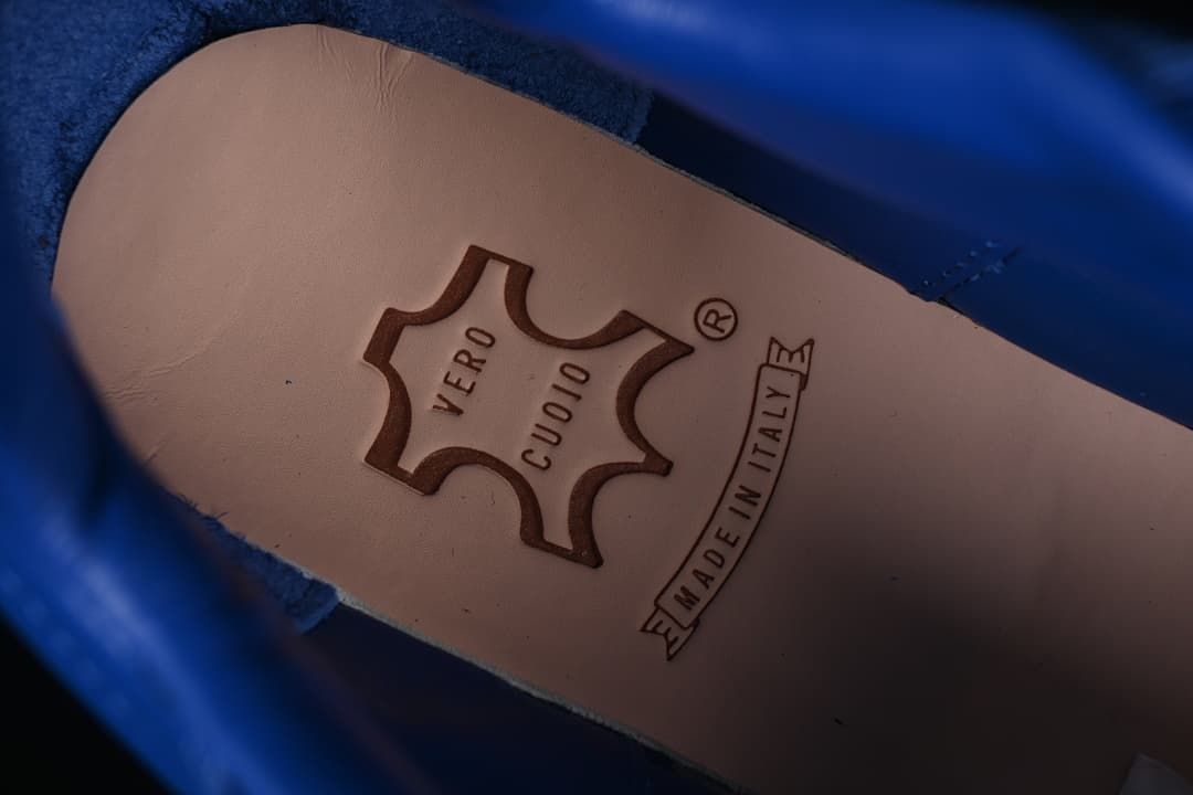 Close-up of an insole stamp reading Cuoio and Made in Italy.