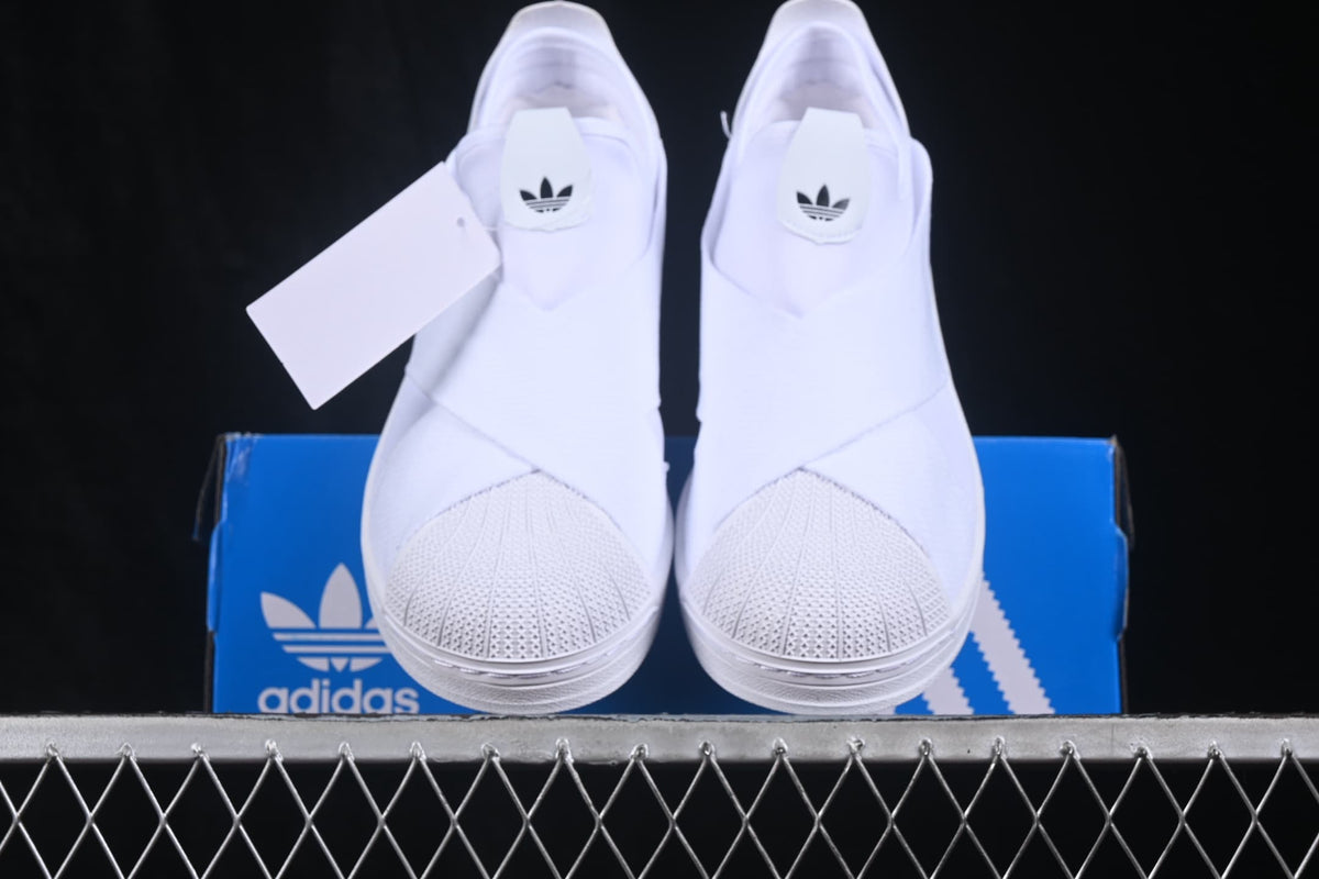 Front view of the pair showing the textured shell-style toes and tongue branding.