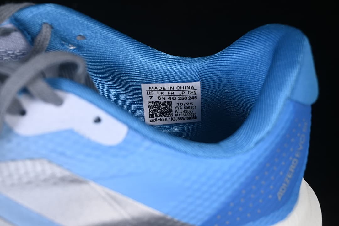 Close-up of the shoe's size label inside the blue heel collar.
