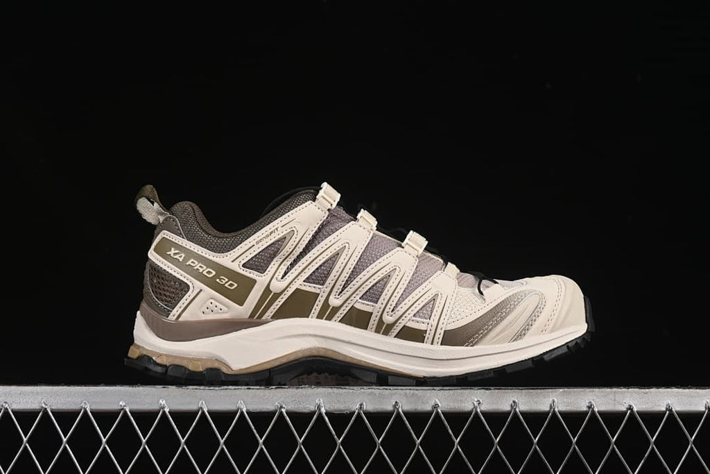 Side profile of a Salomon XA Pro 3D shoe.
