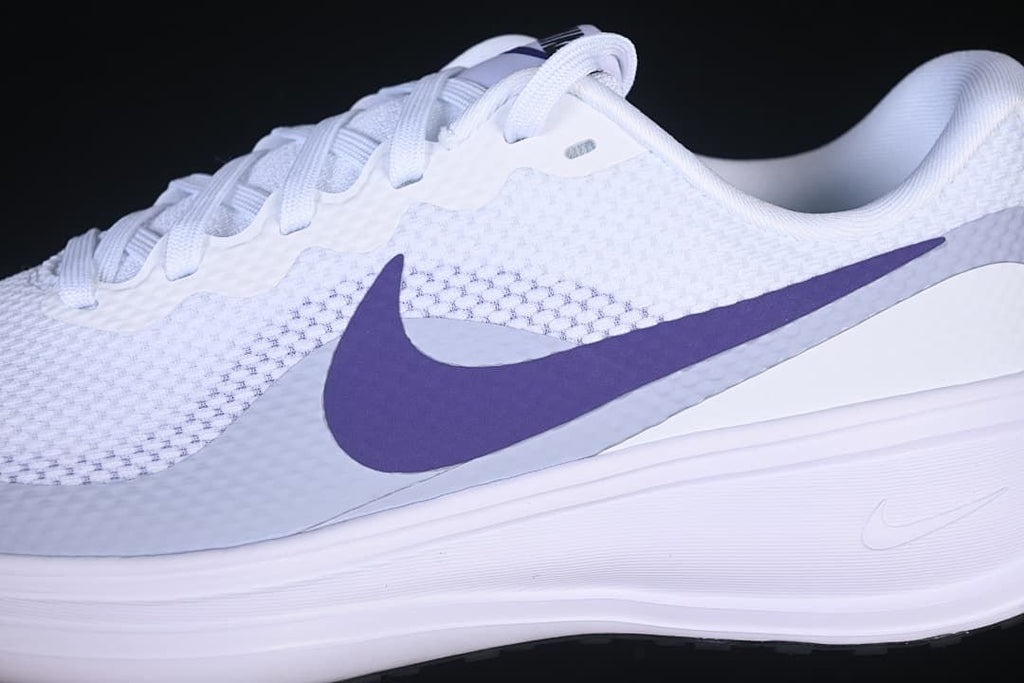 Close-up of the purple side Swoosh and white midsole