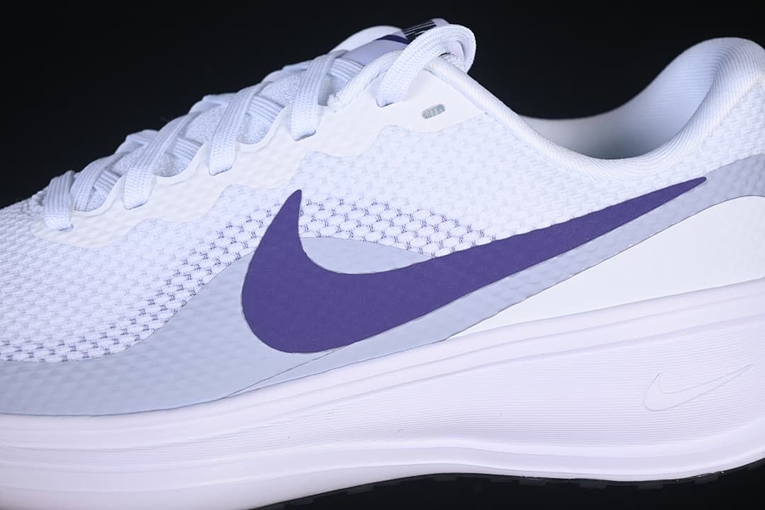 Close-up of the purple side Swoosh and white midsole