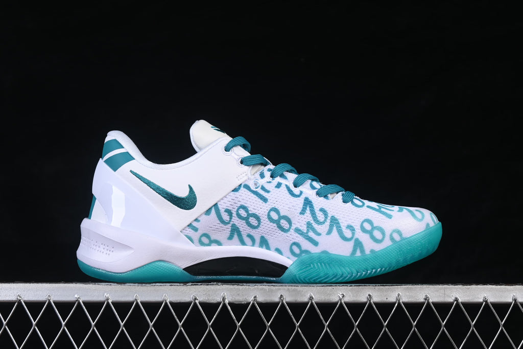 Side profile showing the white upper, teal swoosh, and teal outsole