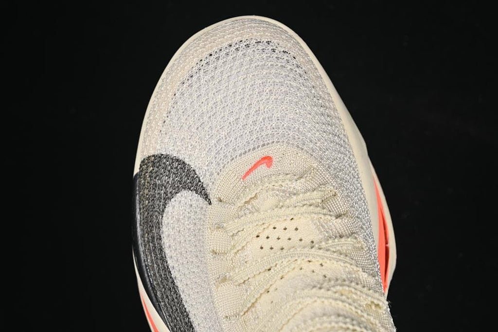 Top-down detail of the knit-look toe and lacing