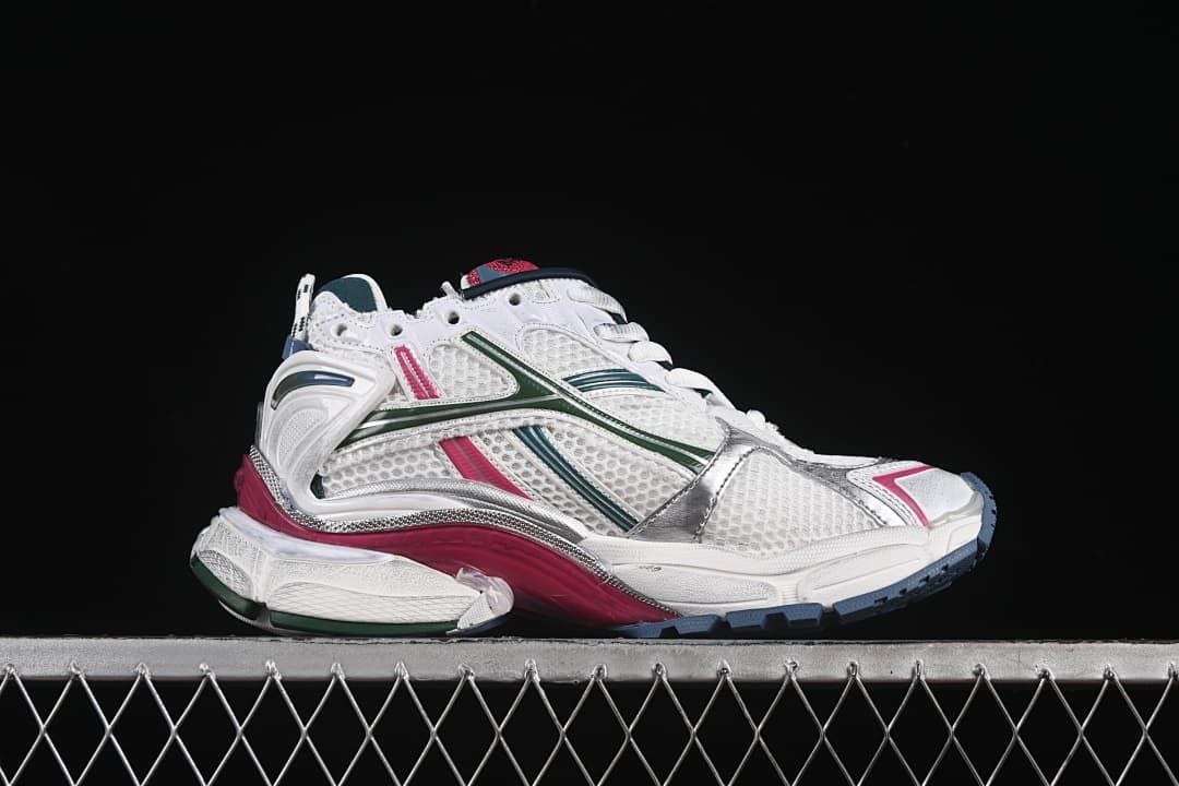 Side profile of the sneaker with layered panels and sculpted sole