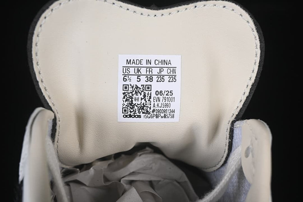 Tongue size label showing EU 38, UK 5, and US 6.5 for the photographed sample.
