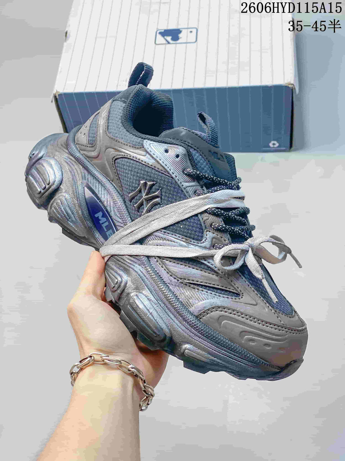 Angled side view showing the layered upper and chunky sole of the MLB sneaker
