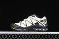 Side view of Salomon XT-Quest GTX shoes in off-white, black, and yellow.