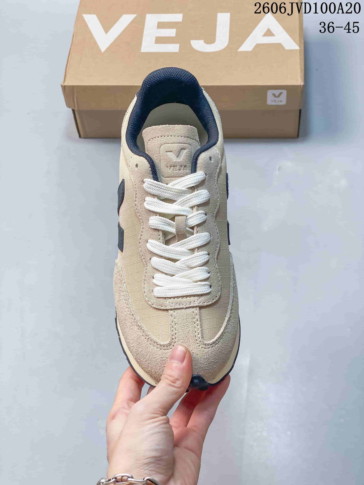 Top view of the sneaker showing white laces and contrasting panels