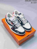 White low-top sneakers with dark blue overlays and repeating patterned side panels, displayed on an orange box.
