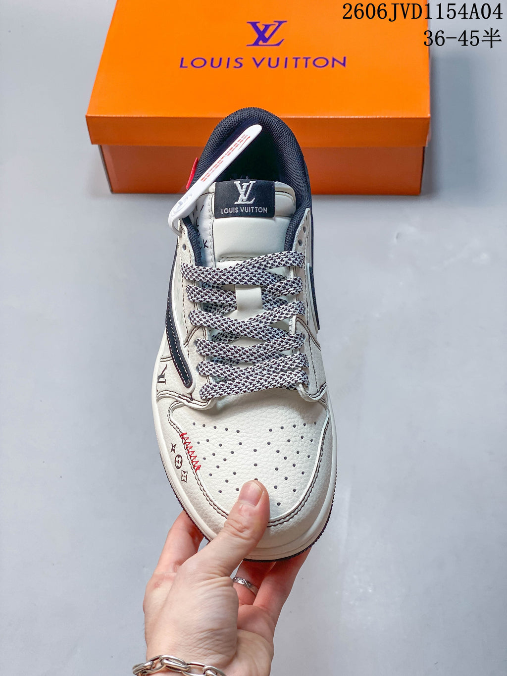 Top view showing the perforated toe, patterned laces and off-white upper.