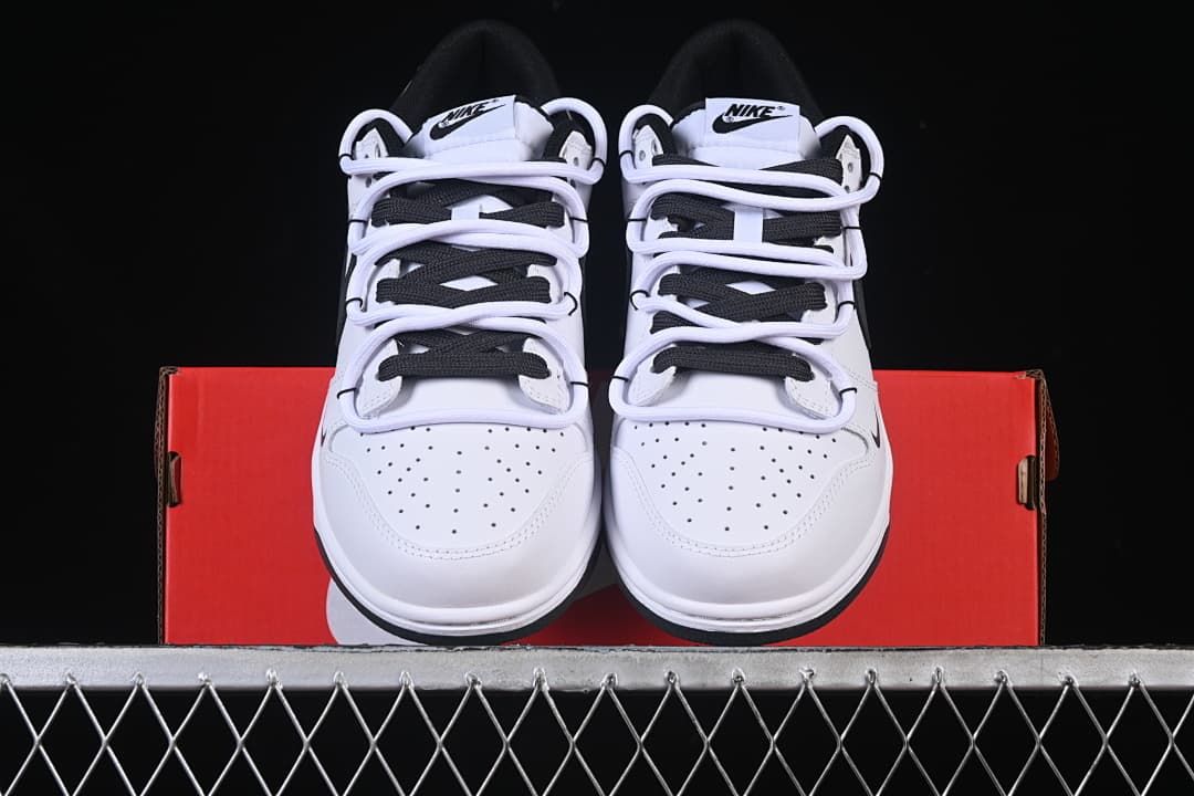 Front view of the pair placed on a red shoe box